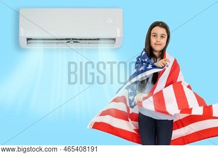 Teenage Girl With The Usa Flag Under The Air Conditioner