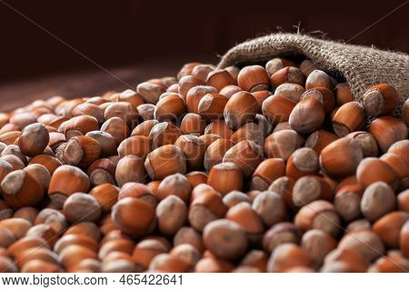 Hazelnuts, Filbert On Old Wooden Table. Heap Or Stack Of Hazel Nuts. Hazelnut Background, Healty Foo