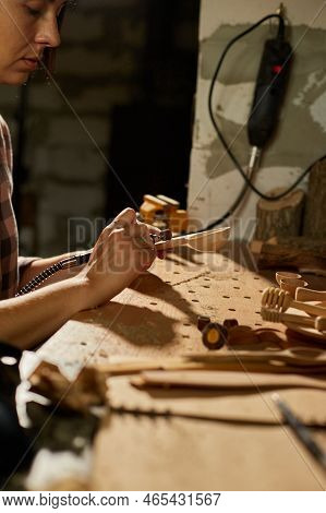 Female Using Power Working Tools Graver For Wooden Utensils Spoon
