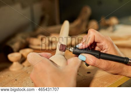 Female Using Power Working Tools Graver For Wooden Utensils Spoon