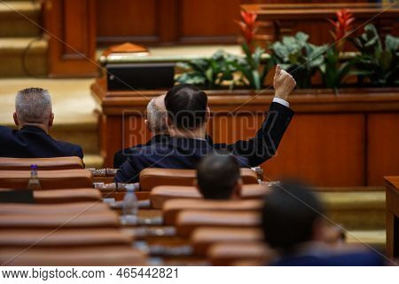 Bucharest, Romania - November 14, 2022:  Romanian Member Of Parliament Gestures To His Colleagues Ho