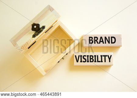 Brand Visibility Symbol. Concept Words Brand Visibility On Wooden Blocks. Beautiful White Table Whit