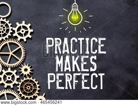 On A White Surface Lies A Red Notebook And A Pen, In The White Notebook The Inscription - Practice M