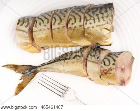 Cold Smoked Chopped Fish On A White Plate With Fork