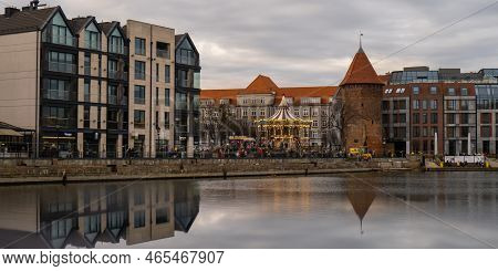 Gdansk, Poland May 2022, Modern Buildings On Granary Island Over The Motlawa River In Old Town. Tour