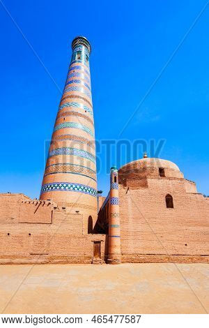 Islam Khodja Minaret At The Itchan Kala, The Walled Inner Town Of The City Of Khiva In Uzbekistan