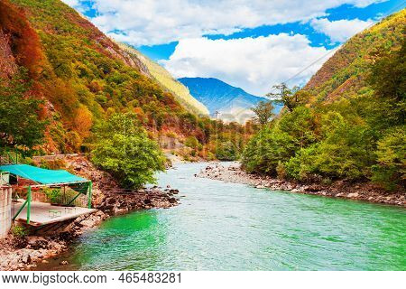 Bzyb River And Caucasus Mountains Autumn Landscape. Bzyb River Flows Near Blue And Ritsa Lake In Abk