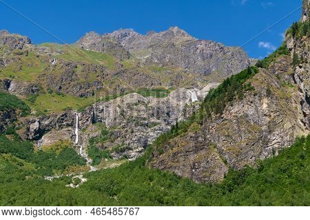 Beautiful Mountain Landscape With Shdugra Waterfall, Mazeri, Svaneti, Georgia On A Sunny Bright Summ