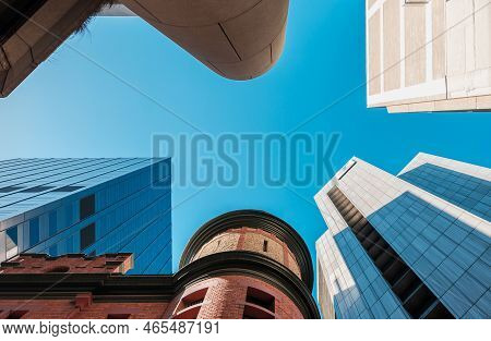 Adelaide City, South Australia - August 23, 20019: High-rise Buildings Viewed Aigainst Blue Sky In A
