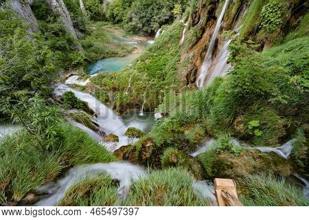 Majestic View Of Waterfall With Crystal Clear Water In Forest In The Plitvice Lakes National Park In