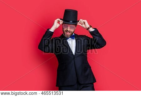 Man Magician Wear Tuxedo Having Fun In Studio. Magician Man Wearing Cylinder Hat. Man Magician