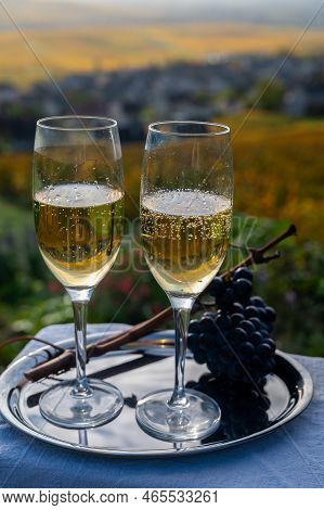 Tasting Of Premier Cru Sparkling White Wine With Bubbles Champagne On Outdoor Terrace With View On C