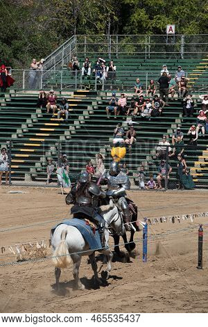 Folsom, Ca, September 24, 2022. Jousting Match Between Knights A White Horse And Black Horse At The 
