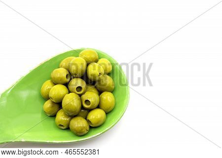 Stuffed Green Olives In A Green Bowl On A White Background, Copy Space