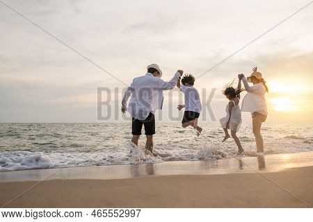 Back People Enjoying Travel Trip And Vacations, Silhouette Of Family Father, Mother, Son And Daughte