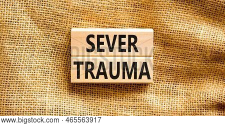 Sever Trauma Symbol. Concept Words Sever Trauma On Wooden Blocks. Beautiful Canvas Table Canvas Back