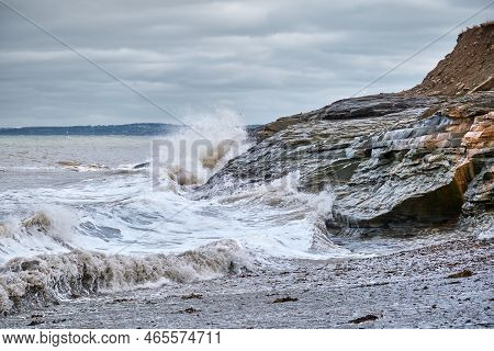 Dramatic Waves Battter The Cliffs At Table Head Beach In Glace Bay Cape Breton Island.