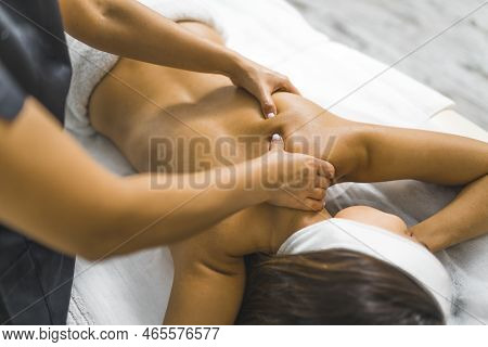 Closeup View Of A Beauty Specialist Making Massage For A Woman At The Spa, Back View Body Care Conce