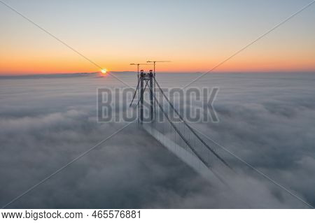 Panoramic Aerial Drone View From Above Of The Suspended Bridge Over Danube River, Under Construction