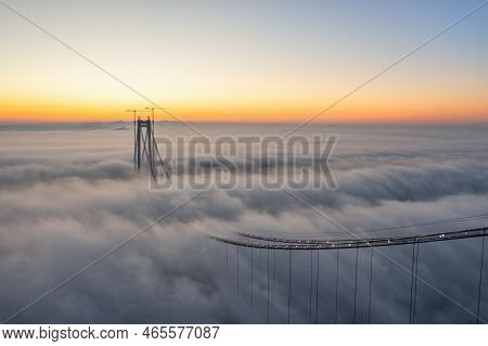 Panoramic Aerial Drone View From Above Of The Suspended Bridge Over Danube River, Under Construction