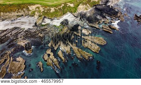 Rocks On The Irish Coast, Top View. The Coast Of The Atlantic Ocean. Nature Of Northern Europe. Rock