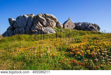 A Small Medieval Watchouse Surrounded By The Rocks In Meneham, Brittany, France