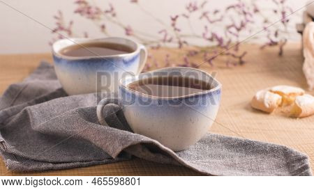 Coockies With Egg White Cover. Portuguese Sweets Known As Cavacas Served With Tea On Ceramic Cups.