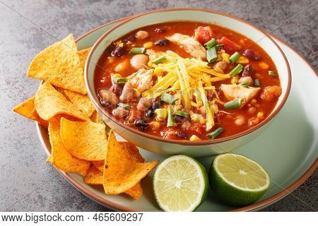 Tasty Chicken Taco Soup Full Of Tender Chicken, Sweet Corn, Black Beans, Fire-roasted Tomatoes, And 