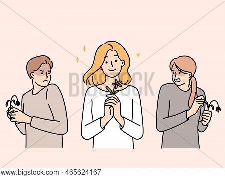 Jealous People Look At Happy Positive Woman Holding Blooming Flower In Hands. Angry Persons Envy Smi