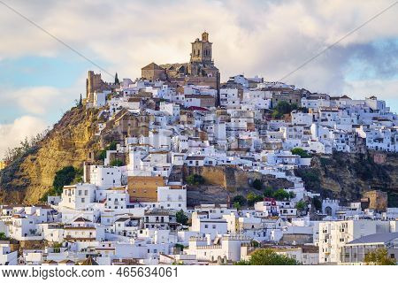 Panoramic Of Arcos De La Frontera, White Town Built On A Rock Along Guadalete River, In The Province