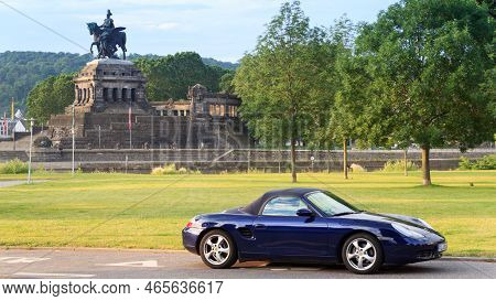 Koblenz, Germany - June 28, 2021: Blue Roadster Porsche Boxster 986 With Deutsches Eck (german Corne