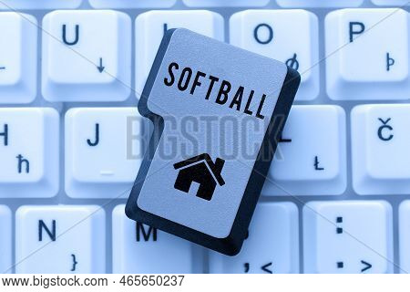 Hand Writing Sign Softball. Business Concept A Sport Similar To Baseball Played With A Ball And Bat