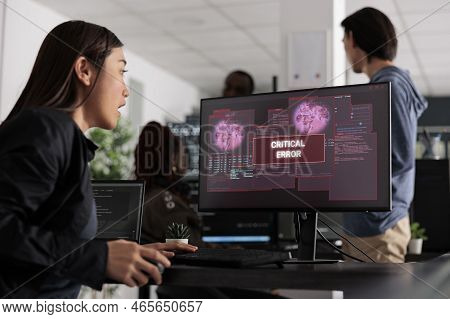 Asian Software Developer Writing Html Code Encountering Hacking Alert On Computer, Dealing With Unex