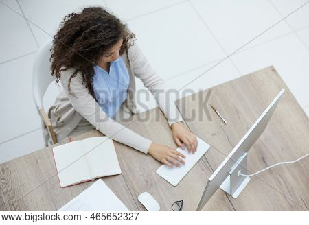 Successful Female Grapic Designer Watching Tutorial About Creative Ideas At Laptop