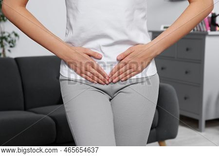 Woman Suffering From Cystitis At Home, Closeup