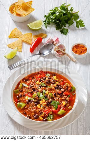 Taco Soup Of Ground Beef, Tomatoes, Chopped Green Chilis, Onions, Corn, Red Beans And Taco Seasoning