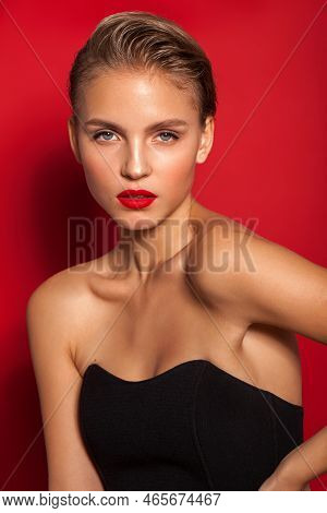 Young Blond Fashion Model With Red Lips