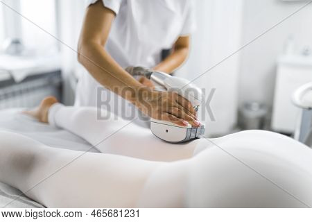 Leg Endermology Lpg Performed By Unrecognizable Caucasian Specialist In White Uniform On Her Asian C