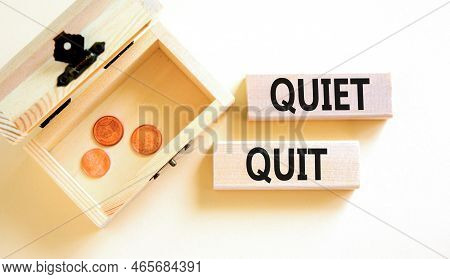 Quiet Quit Symbol. Concept Words Quiet Quit On Wooden Blocks. Beautiful White Table White Background