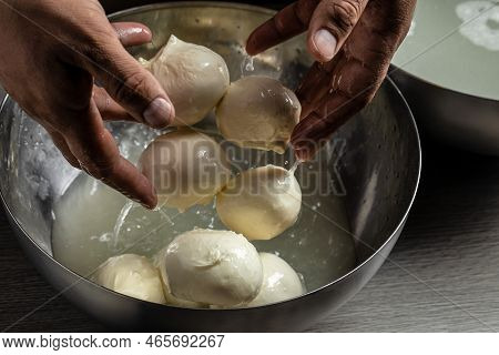 The Processing Traditional Italian Mozzarella, Cheesemaker, Showing Freshly Made Mozzarella,