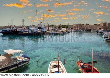 Rhodes, Greece - June 30,2022: Yachts, Boats And Historic Medieval Walls Of The Old Town Dating From