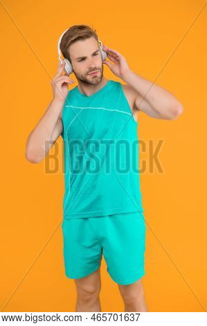 Everyone Needs A Tune-up. Sportsman Listen To Music. Sportsman Training To Tune. Strong Sportsman We