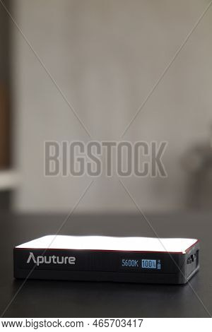 Led Aputure Mc Lit On Top Of A Black Table. Brightness Of Light. Led Concept. Lighting Concept.