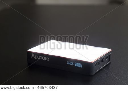 Led Aputure Mc Lit On Top Of A Black Table. Brightness Of Light. Led Concept. Lighting Concept.