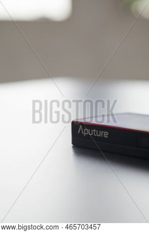 Led Aputure Mc Lit On Top Of A Black Table. Brightness Of Light. Led Concept. Lighting Concept.