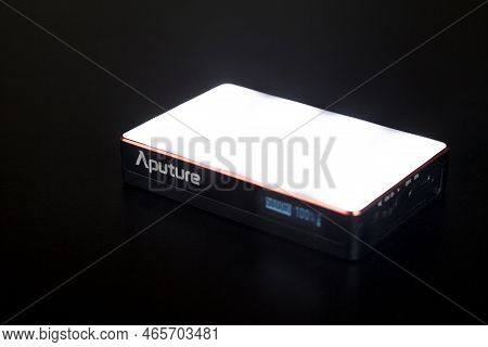 Led Aputure Mc Lit On Top Of A Black Table. Brightness Of Light. Led Concept. Lighting Concept.