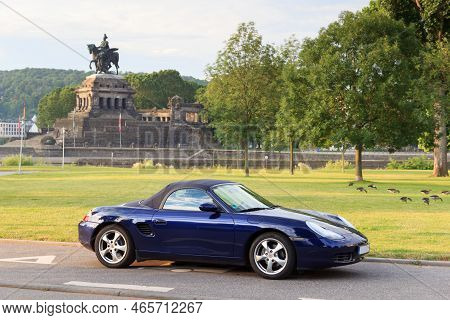Koblenz, Germany - June 28, 2021: Blue Roadster Porsche Boxster 986 With Deutsches Eck (german Corne