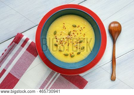 Healthy Breakfast. Cornmeal Porridge With Different Seeds In  Bowl On  Rustic Table. Flat Lay, Copy 
