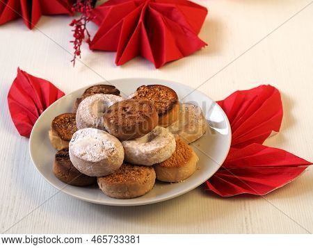 Polvorones, Mantecados, Estepa. Traditional Spanish Christmas Pastry On White Plate. Top View.