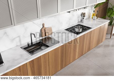 Close Up Top View On Bright Kitchen Room Interior With White Marble Wall, Concrete Floor, Sink, Gas 
